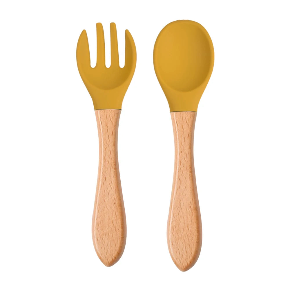 Ensemble de 2 cuillères et fourchettes en silicone pour bébé avec manche en bois - Accessoires d'alimentation pour nourrissons et tout-petits.