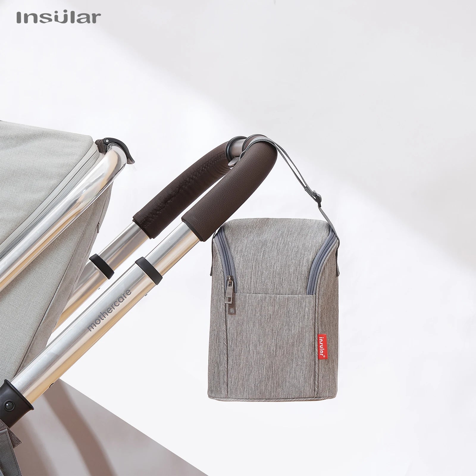 Chauffe-biberon portable Insular avec sac de transport isotherme.