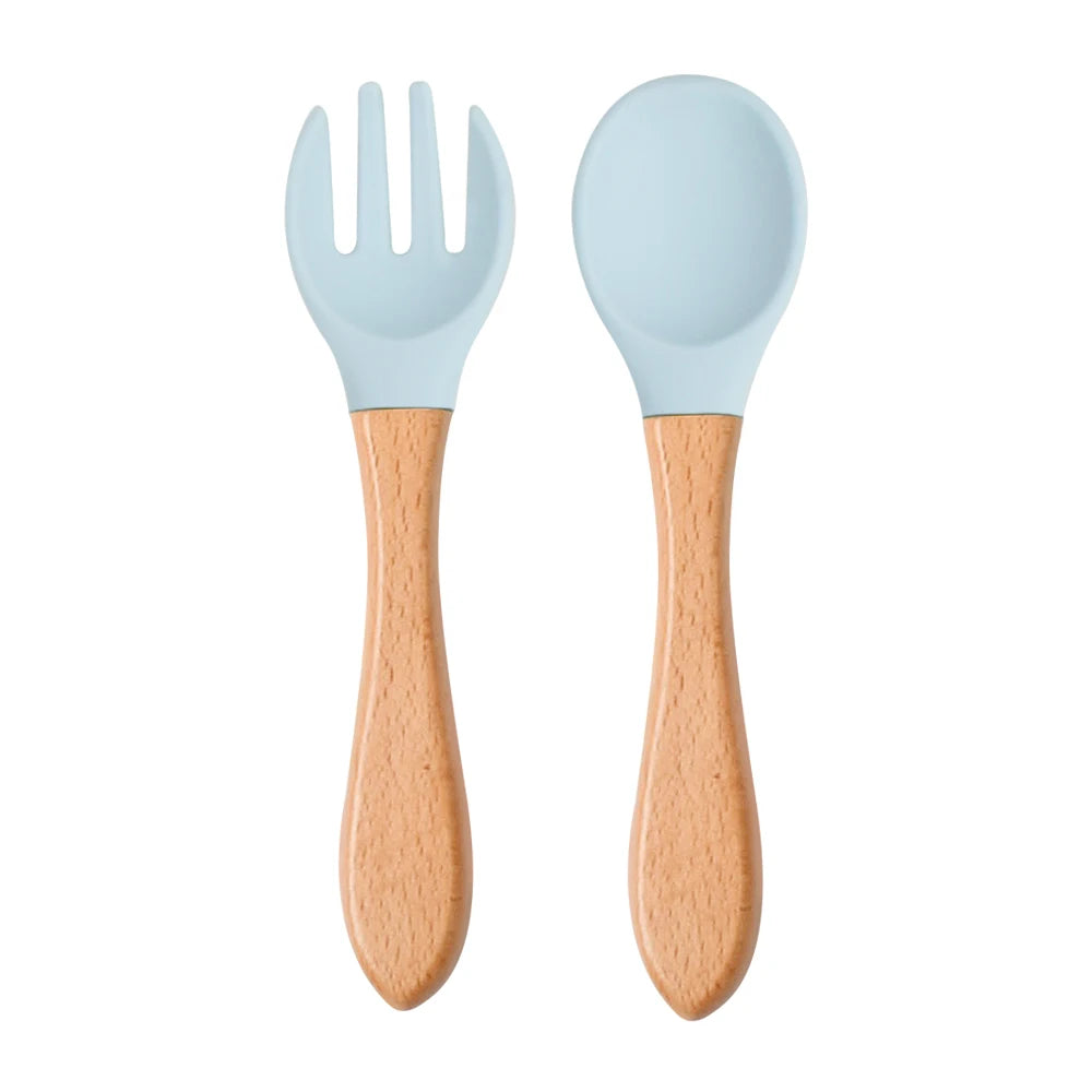 Ensemble de 2 cuillères et fourchettes en silicone pour bébé avec manche en bois - Accessoires d'alimentation pour nourrissons et tout-petits.