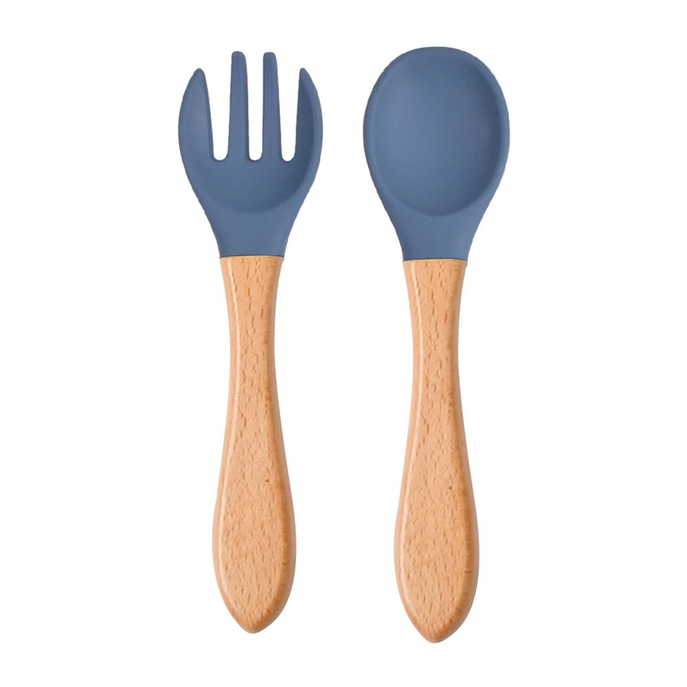 Ensemble de 2 cuillères et fourchettes en silicone pour bébé avec manche en bois - Accessoires d'alimentation pour nourrissons et tout-petits.