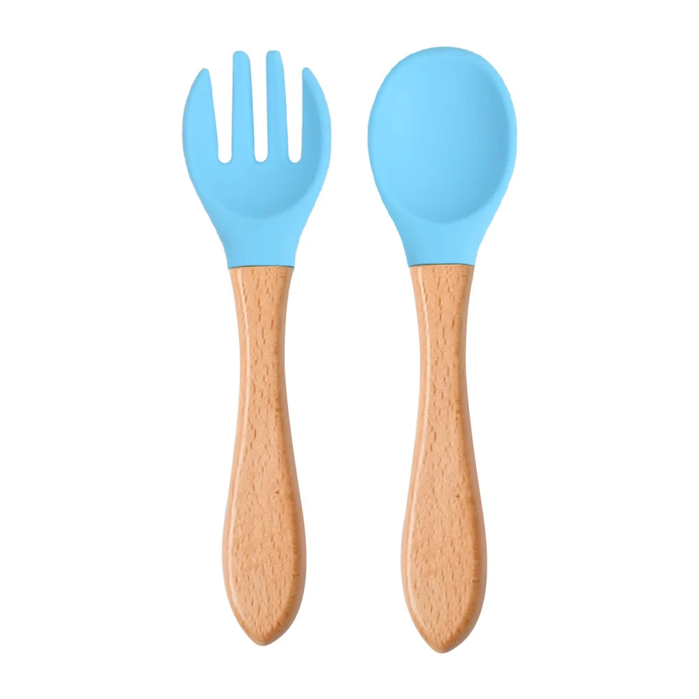 Ensemble de 2 cuillères et fourchettes en silicone pour bébé avec manche en bois - Accessoires d'alimentation pour nourrissons et tout-petits.