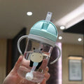 Gobelet/biberon pour enfants de 350 ml avec paille et bille de gravité, grand diamètre.