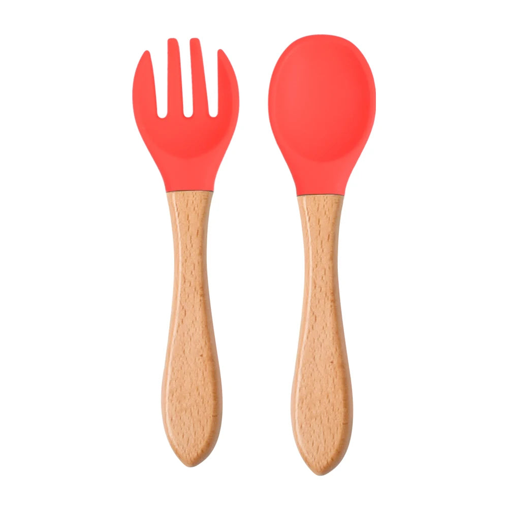 Ensemble de 2 cuillères et fourchettes en silicone pour bébé avec manche en bois - Accessoires d'alimentation pour nourrissons et tout-petits.