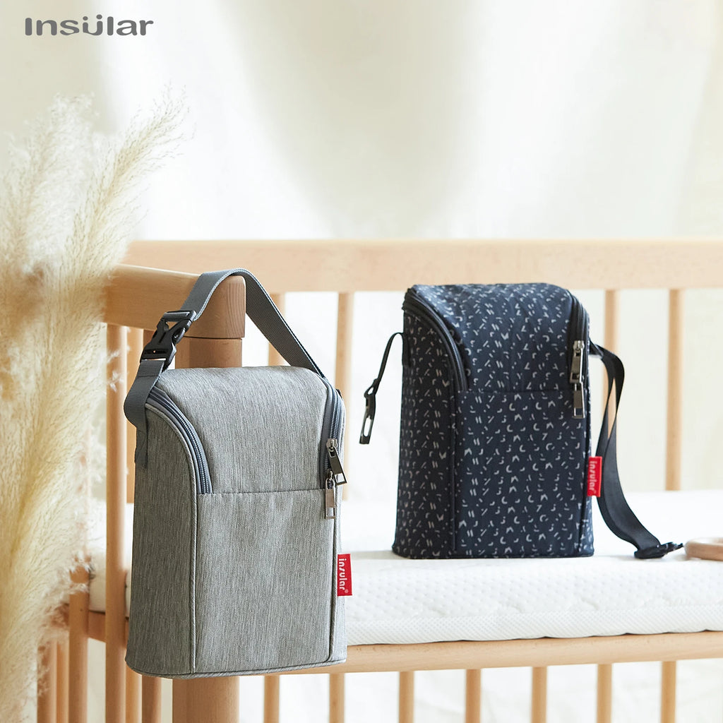 Chauffe-biberon portable Insular avec sac de transport isotherme.