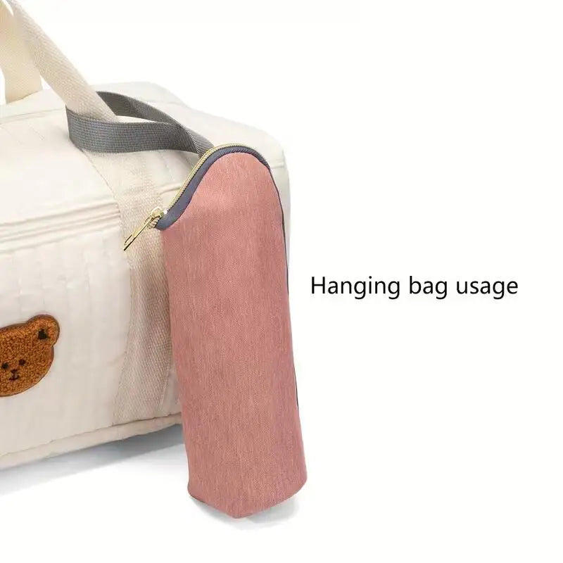 Sac isotherme portable pour biberon, imperméable et chauffant, idéal pour les poussettes et les accessoires d'allaitement.