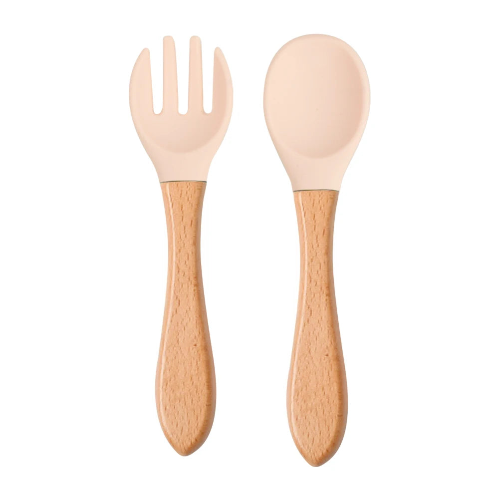 Ensemble de 2 cuillères et fourchettes en silicone pour bébé avec manche en bois - Accessoires d'alimentation pour nourrissons et tout-petits.