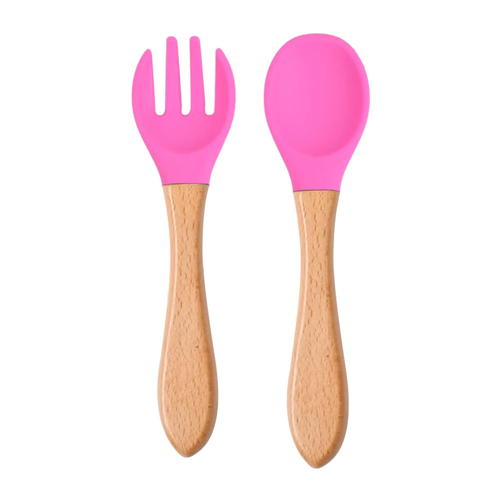 Ensemble de 2 cuillères et fourchettes en silicone pour bébé avec manche en bois - Accessoires d'alimentation pour nourrissons et tout-petits.