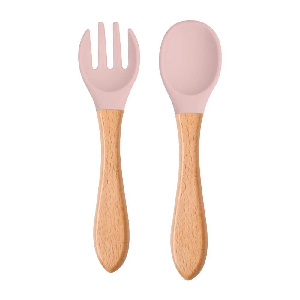 Ensemble de 2 cuillères et fourchettes en silicone pour bébé avec manche en bois - Accessoires d'alimentation pour nourrissons et tout-petits.