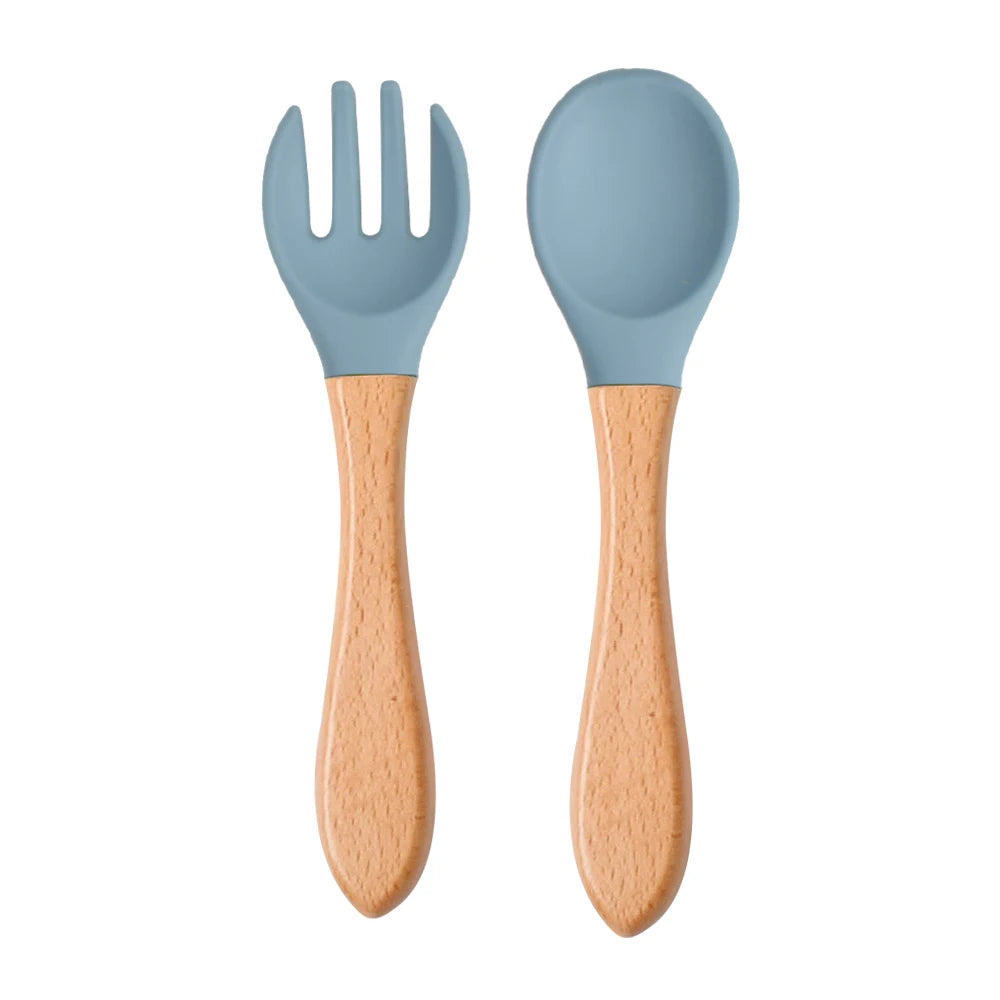 Ensemble de 2 cuillères et fourchettes en silicone pour bébé avec manche en bois - Accessoires d'alimentation pour nourrissons et tout-petits.