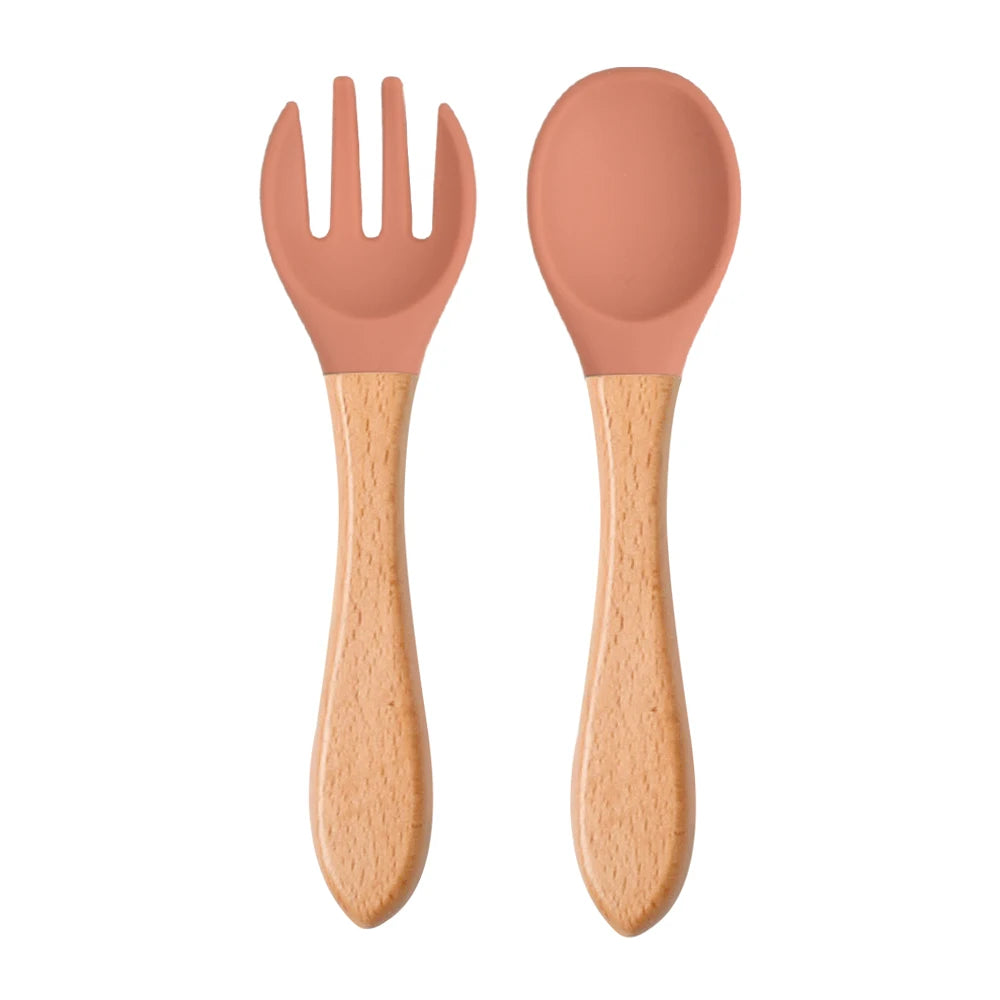 Ensemble de 2 cuillères et fourchettes en silicone pour bébé avec manche en bois - Accessoires d'alimentation pour nourrissons et tout-petits.