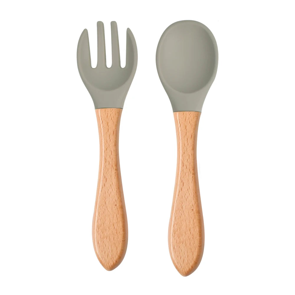 Ensemble de 2 cuillères et fourchettes en silicone pour bébé avec manche en bois - Accessoires d'alimentation pour nourrissons et tout-petits.