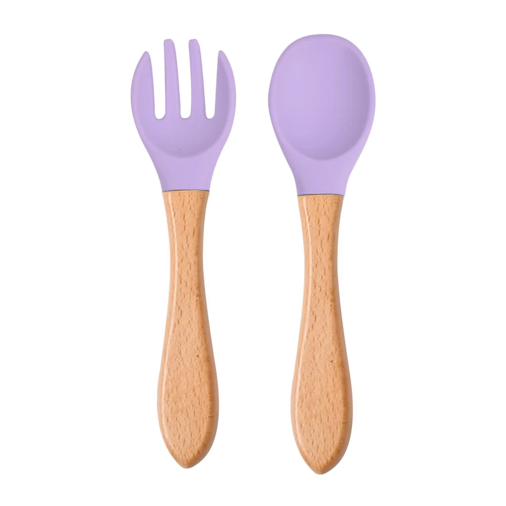 Ensemble de 2 cuillères et fourchettes en silicone pour bébé avec manche en bois - Accessoires d'alimentation pour nourrissons et tout-petits.